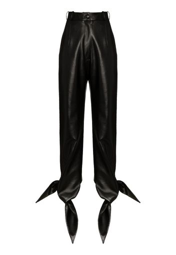 high-waisted faux leather trousers