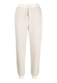 Michael Michael Kors monogram-print track trousers - Toni neutri