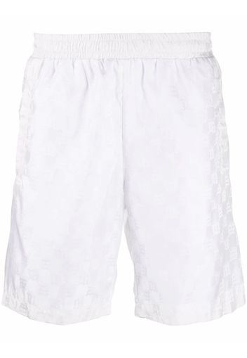 MISBHV monogram-print track trousers - Bianco