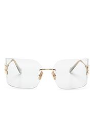 Miu Miu Eyewear Occhiali da sole 54YS con montatura a giorno - Oro
