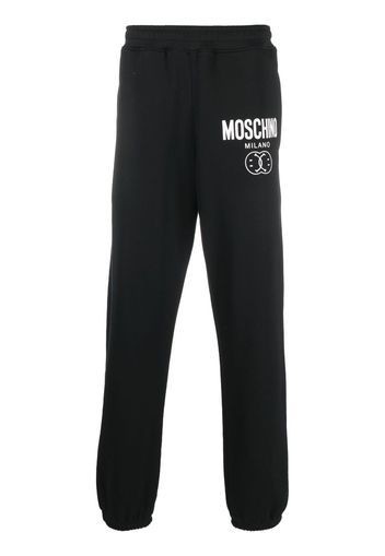 Moschino Shorts sportivi con stampa - Nero