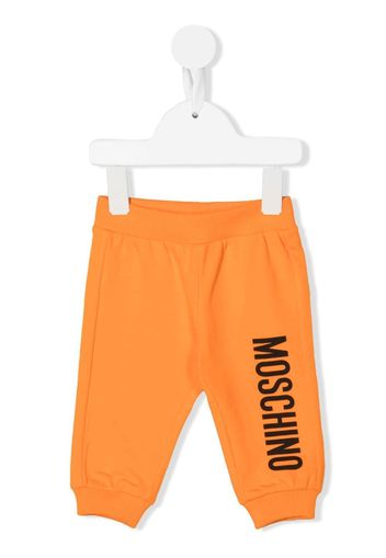 Moschino Kids logo-print tracksuit bottoms - Arancione