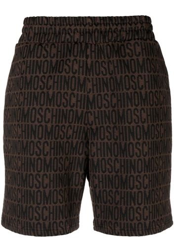 Moschino monogram-print track shorts - Marrone