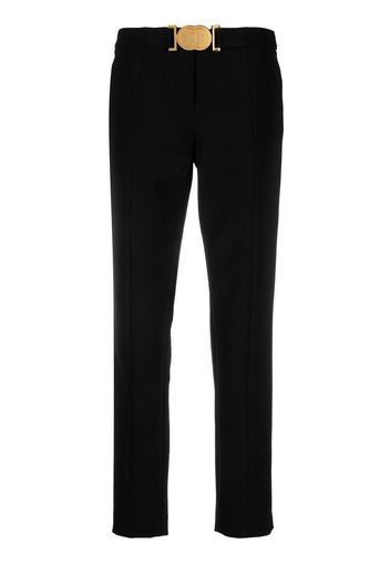 Moschino Smiley-buckle tapered trousers - Nero