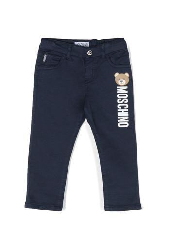 Moschino Kids logo-print straight-leg trousers - Blu