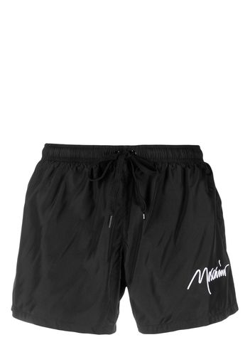 Moschino logo-embroidered swim shorts - Nero