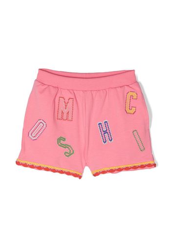 Moschino Kids all-over logo-embroidered shorts - Rosa