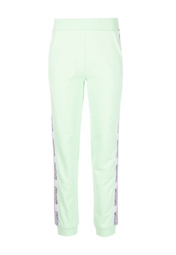 Moschino embossed-logo jersey trousers - Verde