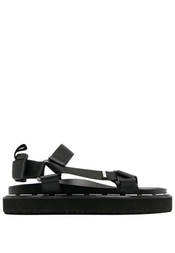 Moschino logo-print slingback sandals - Nero