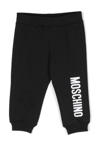 Moschino Kids logo-print tapered track pants - Nero