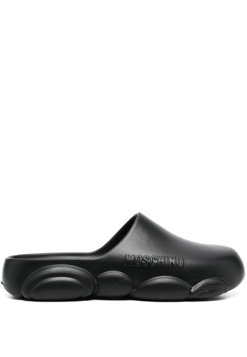 Moschino logo-embossed slip-on clogs - Nero