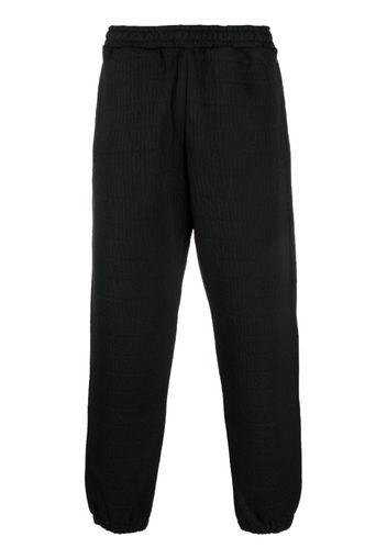 Moschino logo-pattern elasticated-waistband track pants - Nero