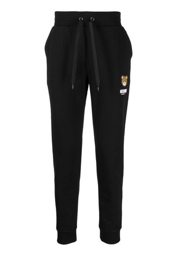 Moschino logo-patch track pants - Nero