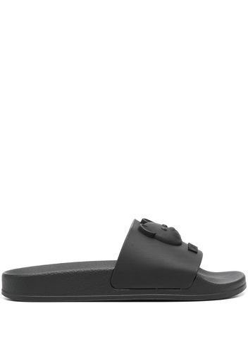 Moschino logo-embossed pool slides - Nero