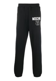 Moschino Shorts sportivi con stampa - Nero