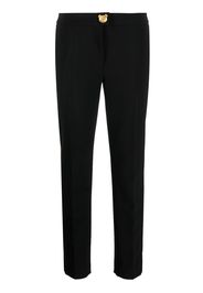 Moschino tapered side-stripe trousers - Nero