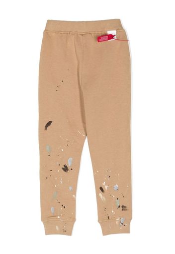 Mostly Heard Rarely Seen 8-Bit paint-splatter track pants - Marrone