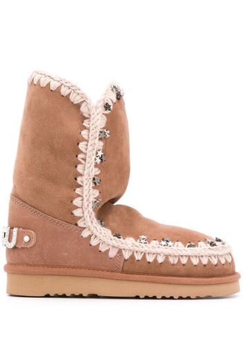 Eskimo star-studded boots