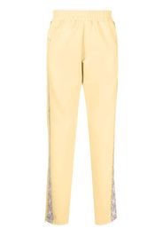 MOUTY logo-print track pants - Giallo