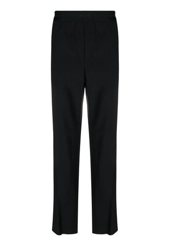 MSGM logo-waistband straight-leg trousers - Nero