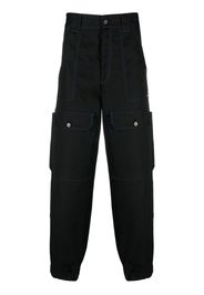 MSGM contrasting-stitch logo-patch trousers - Nero