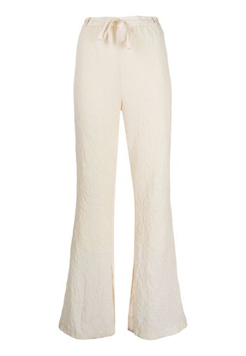 Muller Of Yoshiokubo crinkled-finish drawstring trousers - Bianco