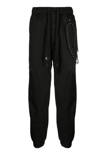 Musium Div. logo-patch track pants - Nero