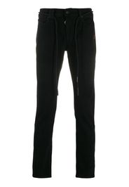Jeans slim con cintura a cordoncino