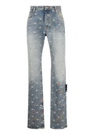 Off-White logo-jacquard paint-splatter jeans - Blu