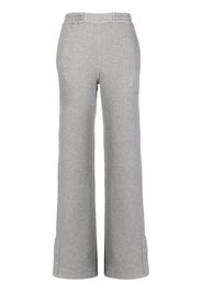 Off-White Pantaloni sportivi svasati con strisce oblique - Grigio