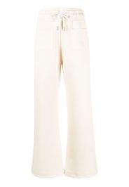 Off-White logo-embroidered flared track pants - Giallo