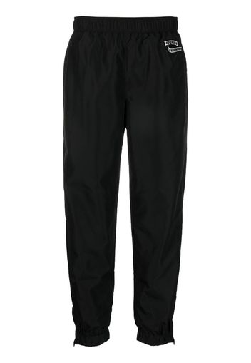 Opening Ceremony logo-patch track corti pants - Nero