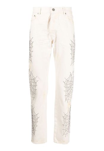 Palm Angels Jeans slim con decorazione - Bianco