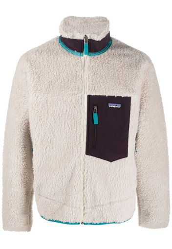 Patagonia contrasting-pocket faux-shearling jacket - Toni neutri