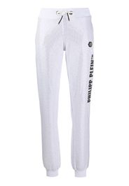 Pantaloni sportivi con borchie