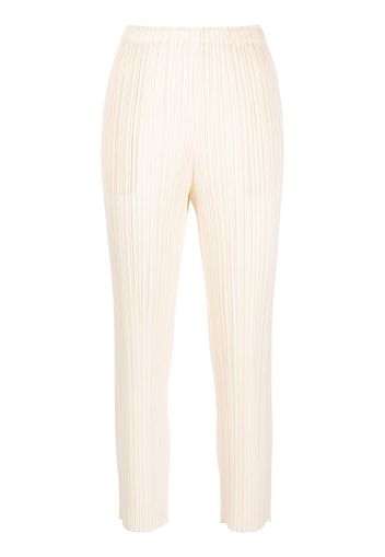 Pleats Please Issey Miyake Pantaloni crop con pieghe - Toni neutri