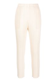 Pleats Please Issey Miyake Pantaloni crop con pieghe - Toni neutri