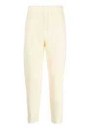 Homme Plissé Issey Miyake Pantaloni crop MC July plissettati - Bianco