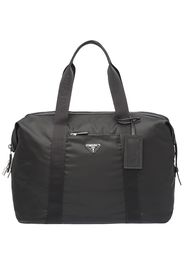 Gucci logo-print canvas holdall - Toni neutri