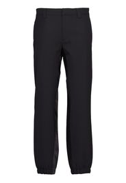 Prada rear logo-plaque trousers - Nero