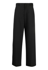 Prada logo-patch wide-leg trousers - Nero