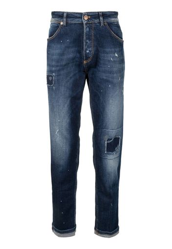 Jeans slim effetto vissuto