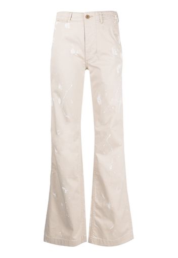 R13 paint-splatter flared trousers - Toni neutri