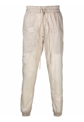 Rick Owens X Champion embroidered-logo tapered trousers - Toni neutri