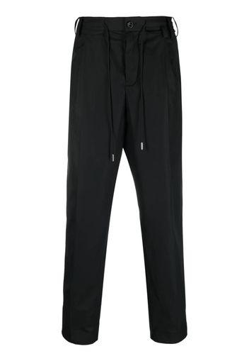 sacai pressed-crease drawstring-waist trousers - Nero