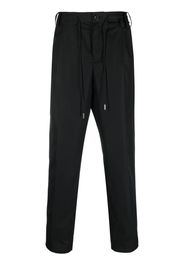 sacai pressed-crease drawstring-waist trousers - Nero