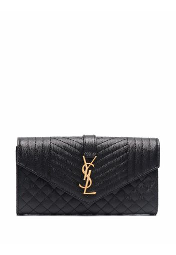 Saint Laurent large flap wallet in grain de poudre embossed leather - Nero