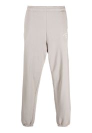 Sporty & Rich logo-print cotton track trousers - Toni neutri