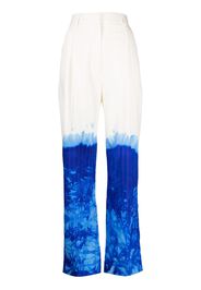 Stain Shade tie-dye wool suit trousers - Bianco