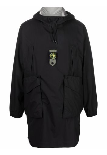 Stone Island logo-patch drawstring-hood raincoat - Nero